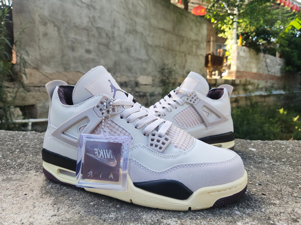 A Ma Maniére x Air Jordan 4 Brown & Pink Sneakers